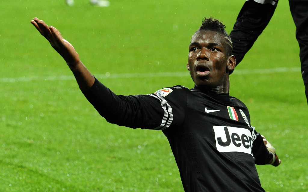 French midfielder of Juventus, Paul Pogba, jubilates after scoring the 2-1 against Bologna during their Italian Serie A soccer match at the Juventus-Stadium in Turin, 31 October 2012. ANSA/DI MARCO